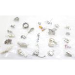 Twenty-five pairs of silver and silver set earrings