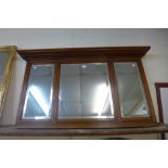 A Victorian walnut overmantel mirror, 77cms h x 139cms w