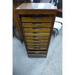 An early 20th Century oak tambour front filing cabinet, 110cms h, 45cms w, 35cms d