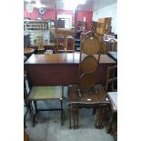 A mahogany folding cake stand, a mahogany nest of tables and an occasional table