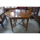 An Arts and Crafts mahogany octagonal centre table, manner of Edward William Godwin, 72cms h,