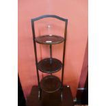 An Edward VII mahogany folding cake stand