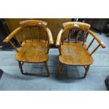 A pair of stained beech captain's chairs