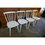 A set of four Danish painted beech kitchen chairs