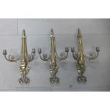 A set of three French Neo-Classical style ormolu electric wall sconces, 59cms h