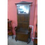 An early 20th Century oak hallstand, 192cms h, 91cms w, 34cms d