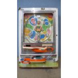 A Japanese Mizuho wall mounted pinball game