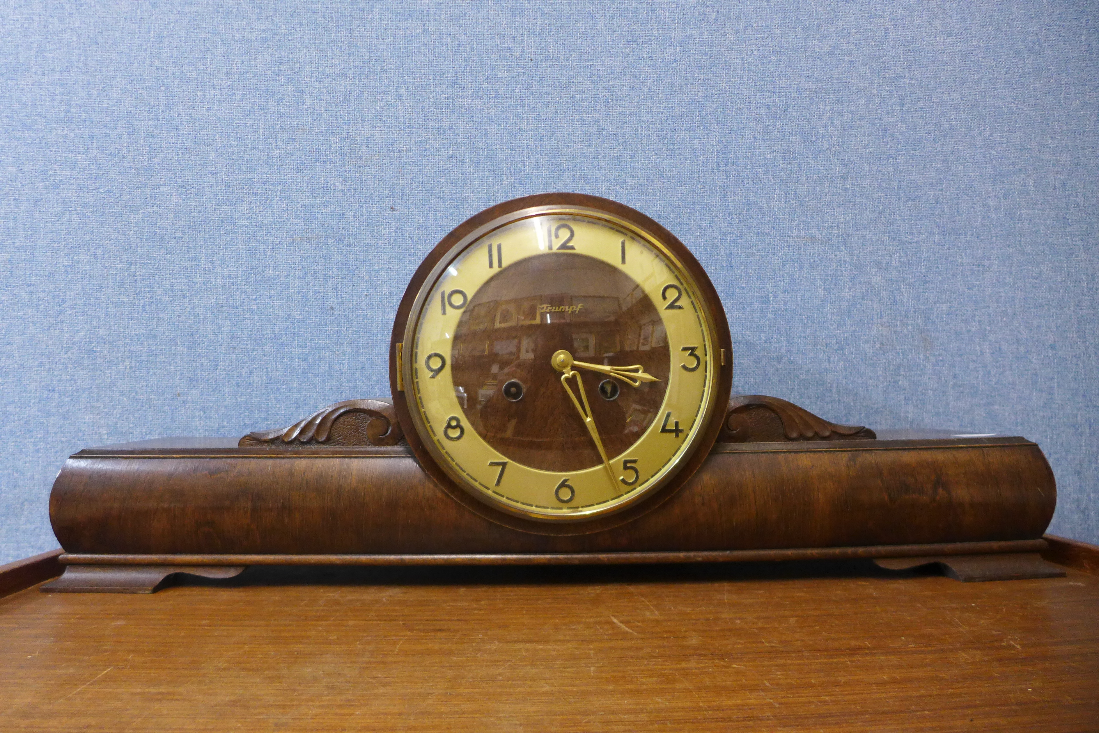 An Art Deco walnut mantel clock, 25cms h