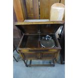 An oak barleytwist gramophone cabinet