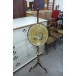 A Victorian mahogany and silk embroidered pole screen