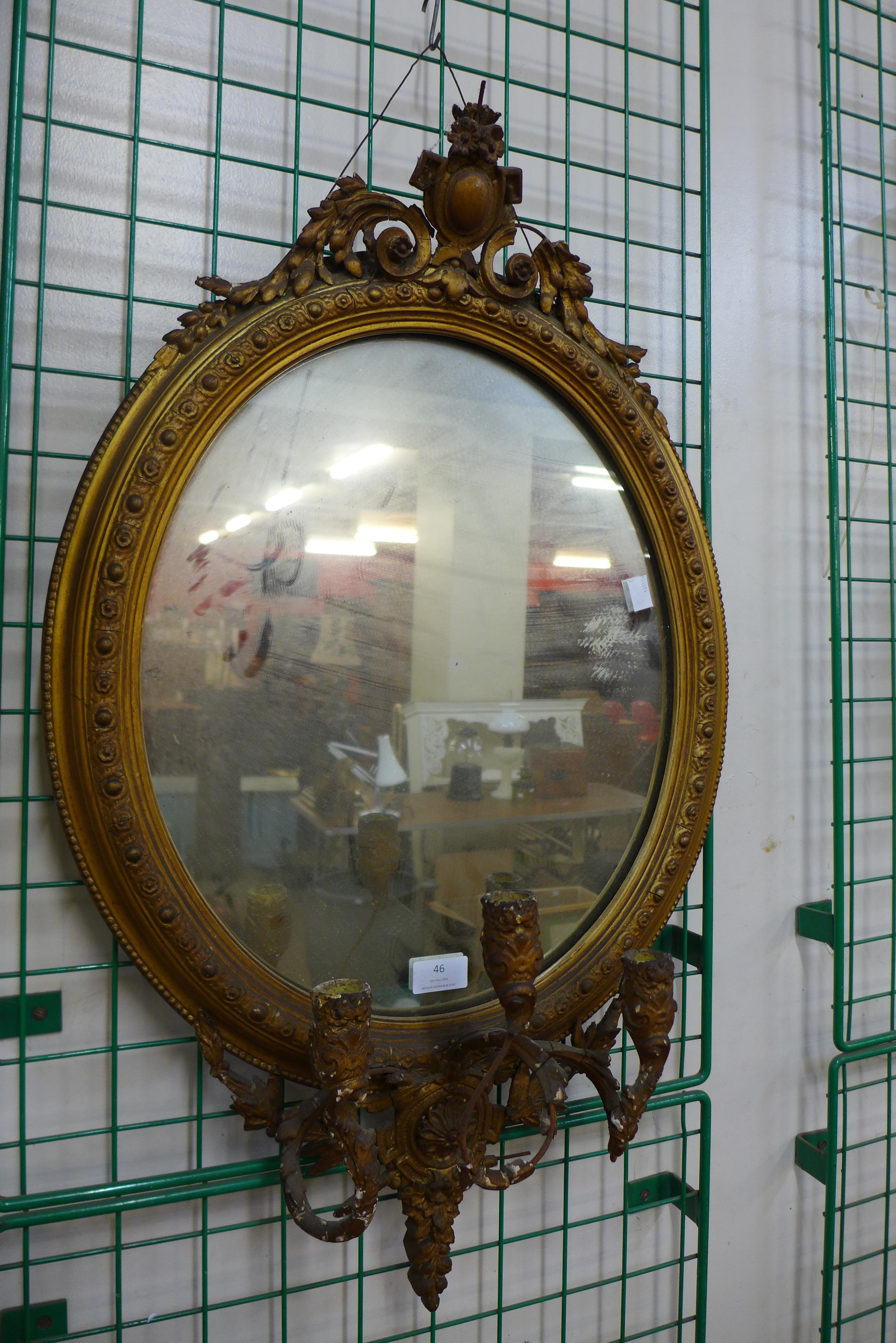 A 19th Century gilt framed girondole, 76cms h