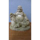 A concrete Buddha garden ornament