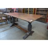 A carved oak refectory table, 72cms h, 75cms w, 165cms l