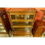 A 19th Century carved oak three tier sectional stacking bookcase, 129cms h, 90cms w, 38cms d