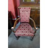 An Arts and Crafts George Walton style oak open armchair
