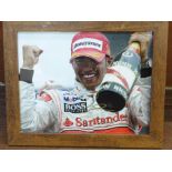 Formula 1; a framed and signed photograph, Lewis Hamilton, frame 24 x 29cm