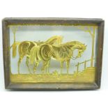 A detailed etched gilt metal silhouette picture of two horses, framed, 18.5 x 26cm