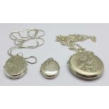 Three silver lockets, circular locket 33mm