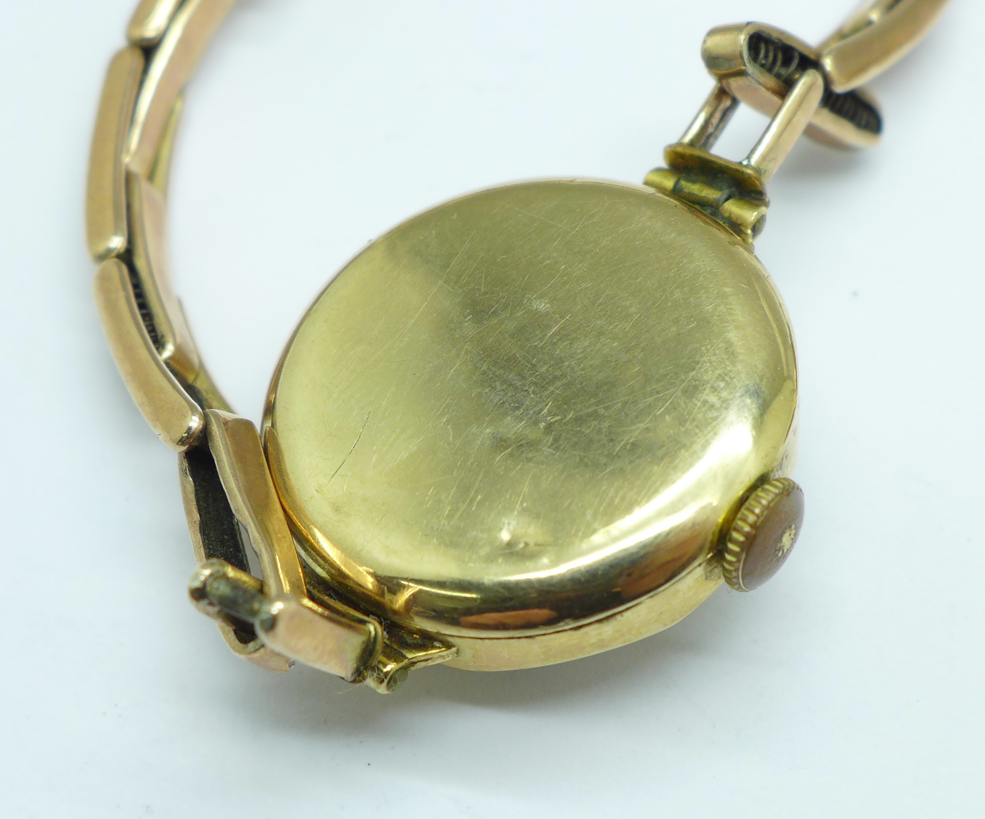 A Pioneer 9ct gold wristwatch head with long service inscription and a lady's 9ct gold case - Image 5 of 5