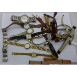 A collection of wristwatches and wristwatch straps