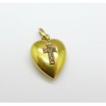 A 15ct gold heart shaped pendant set with an old cut diamond cross, worn Chester hallmark, 1.5g,