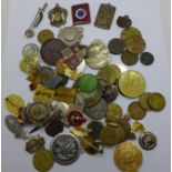 A collection of badges, medallions, commemoratives, fobs including one WWI Tarbrax and District,