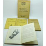 Four Air Raid Precautions handbooks and a Home Office Air Raid booklet