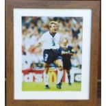 A framed and signed photograph of Stuart Pearce, taken after his penalty at Euro '96, frame 29.5 x