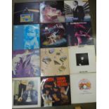 Twelve rock LP records including Pink Floyd, Queen, The Who, Free, etc.