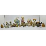 A Beatrix Potter figure, Little Pig Robinson, and Wade Whimsies, Flintstones, Lady and the Tramp,
