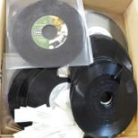 A collection of jukebox 7'' singles including Oasis, Blur, Stone Roses, Queen, Def Leppard, Bon