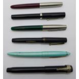 A Stephens No.106 fountain pen with 14k gold nib, a Parker Lucky Curve fountain pen and four other