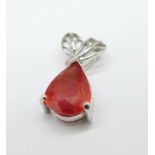 An 18ct white gold pendant with faceted pear shaped red/orange stone, 2.4g, width of stone 7mm