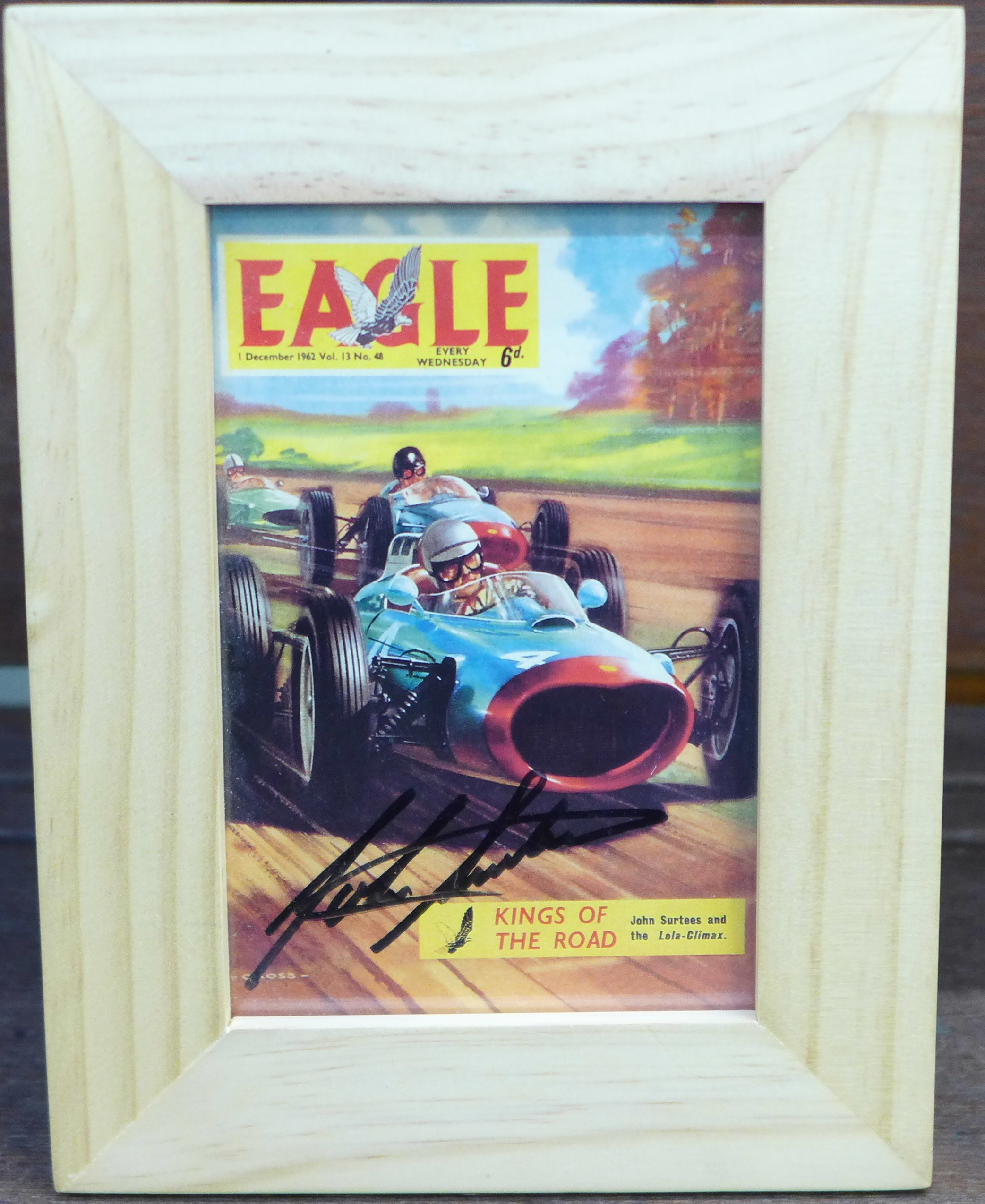 A small framed modern postcard featuring the cover of Eagle comic of December 1962, Kings of The