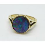 A 9ct gold and black doublet opal ring, edge of opal a/f, 3.8g, P