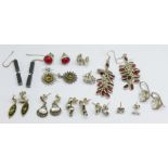 Twelve pairs of silver earrings, 48g