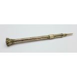 A 19th Century yellow metal cased, seal end pencil, 15.5g gross