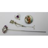 A Charles Horner silver hat pin and three silver brooches