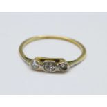 A yellow metal set, three stone diamond ring, shank a/f, 1.3g, O