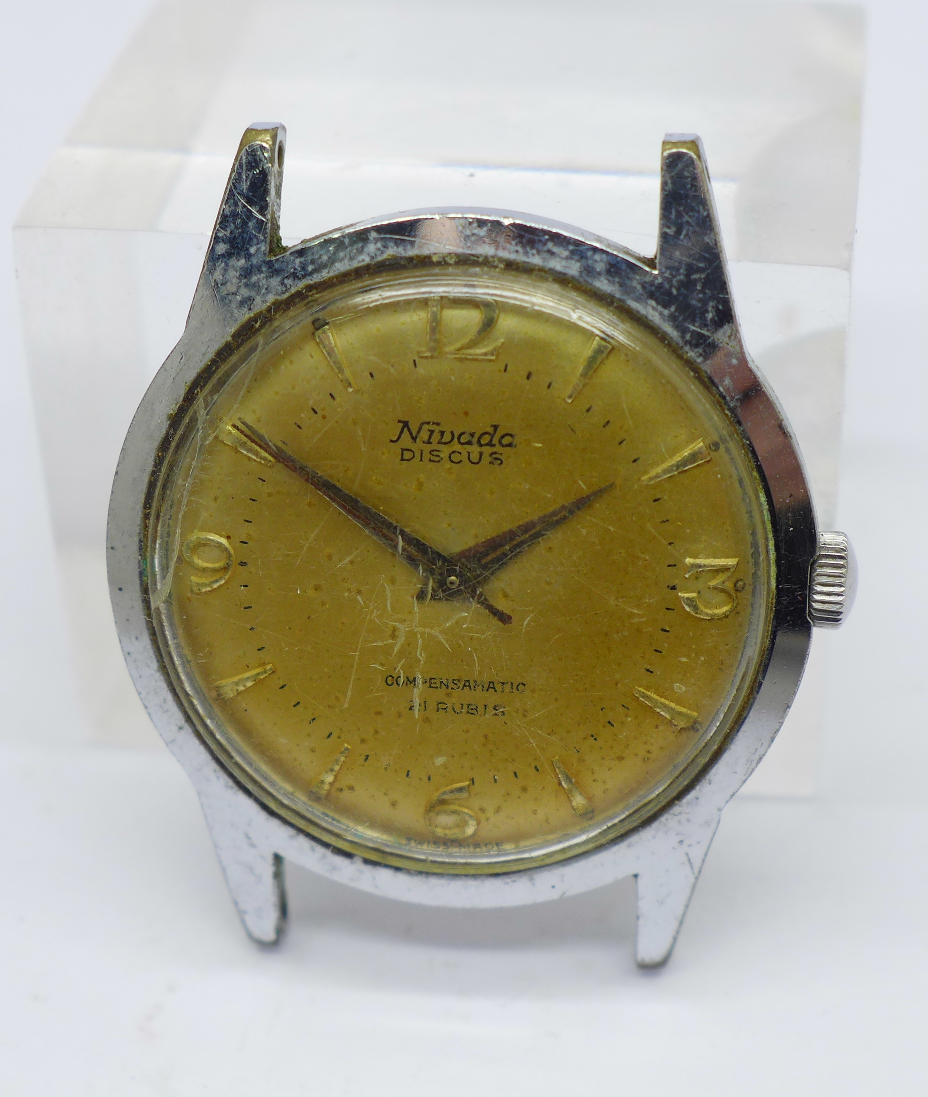 A stainlesss steel Nevada Discus Compensamatic wristwatch head