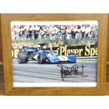 Formula 1; a framed and signed photograph, Jackie Stewart, frame 24 x 29cm