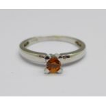 A 9ct white gold, orange stone set ring, 2.2g, N