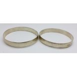 Two bangles marked SIL, (test as silver), 33.9g