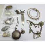 Silver jewellery including lockets and chains, a charm bracelet, a bangle and two small bangles,