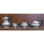 A four piece silver tea service, each piece with monogram, Birmingham 1906/07, 1478g
