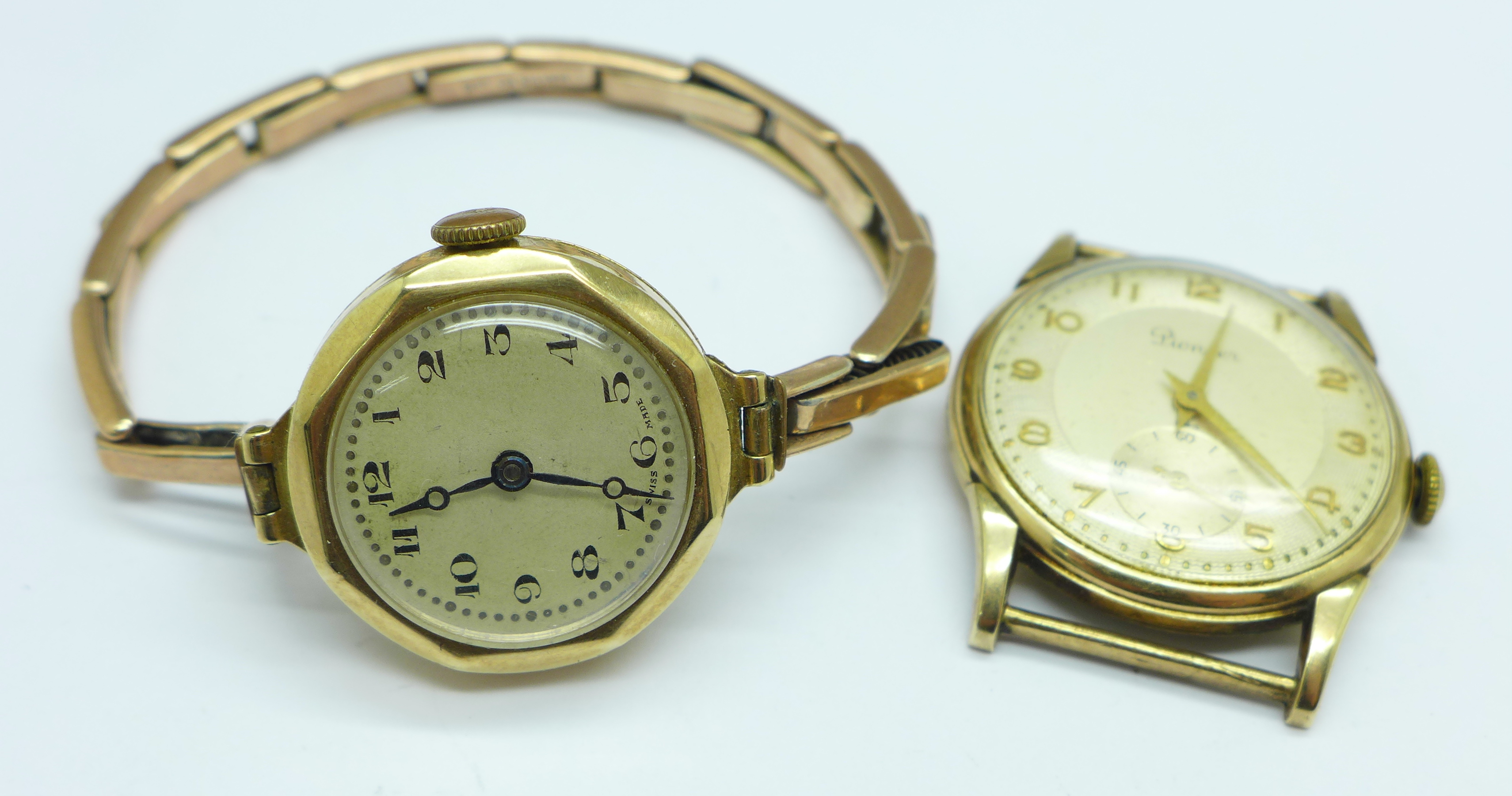 A Pioneer 9ct gold wristwatch head with long service inscription and a lady's 9ct gold case