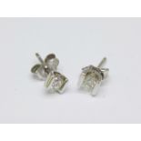 A pair of 9ct white gold and diamond ear studs