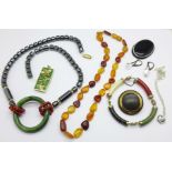 Jewellery including a hematite necklace, an amber necklace, a stone set bracelet, an unmounted