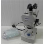 A Technico XE-Series binocular microscope