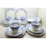 Six Wileman trios, two spare plates and three spare saucers